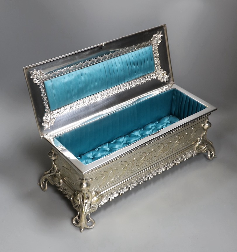 Large WMF plated presentation box, with pleated and buttoned turquoise satin interior, 39 cms wide x 15.5 cms high.